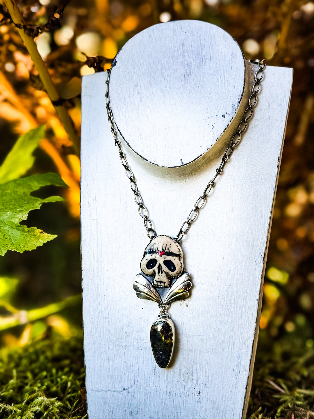 Heart Of Glass- Dinosaur Bone Pyrite and Skull Necklace